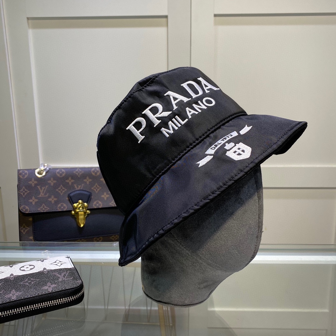 Prada Canvas Bucket Hat - FashionPlug