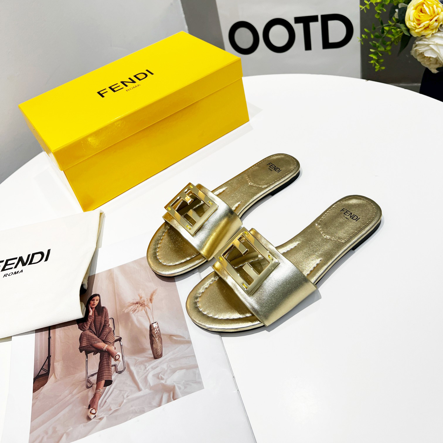 Fendi Baguette Gold nappa leather slides - FashionPlug