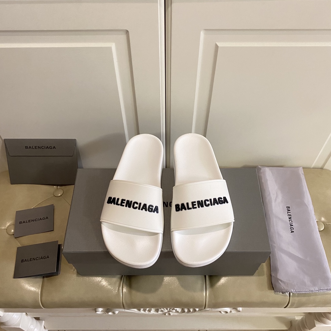 Balenciaga Pool Slide Sandal In White Smooth Rubber With Black 3D Balenciaga Logo - FashionPlug