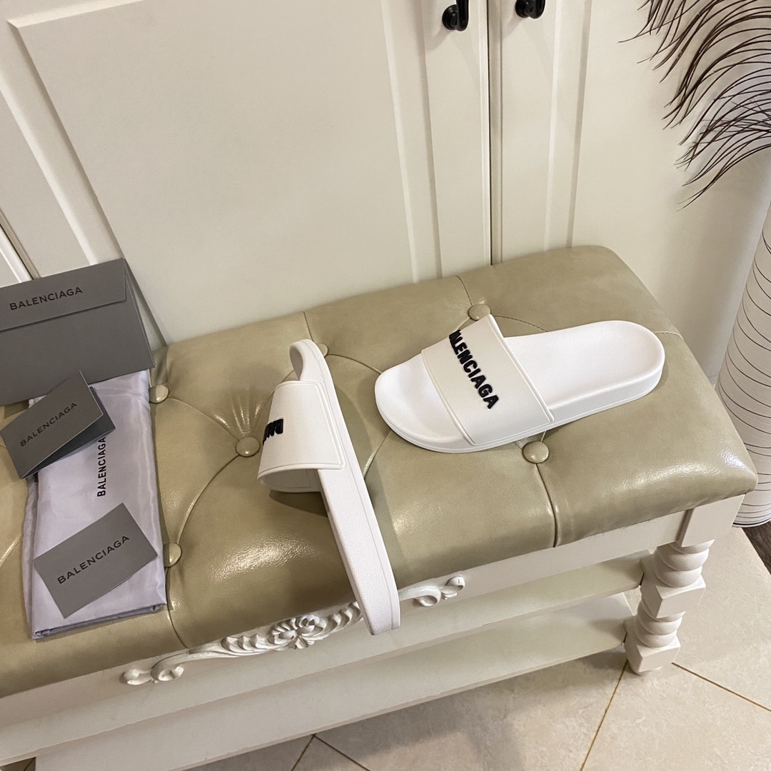 Balenciaga Pool Slide Sandal In White Smooth Rubber With Black 3D Balenciaga Logo - FashionPlug