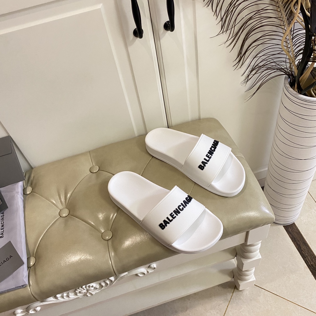 Balenciaga Pool Slide Sandal In White Smooth Rubber With Black 3D Balenciaga Logo - FashionPlug