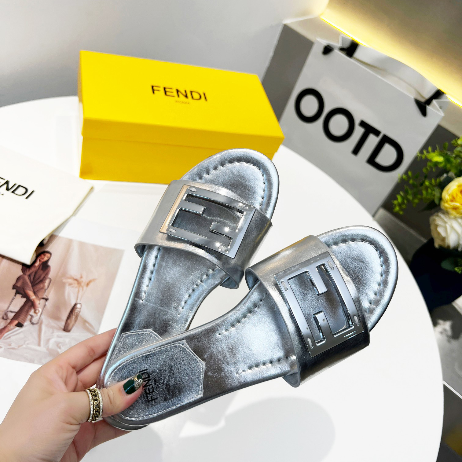 Fendi Baguette Silver Nappa Leather Slides - FashionPlug