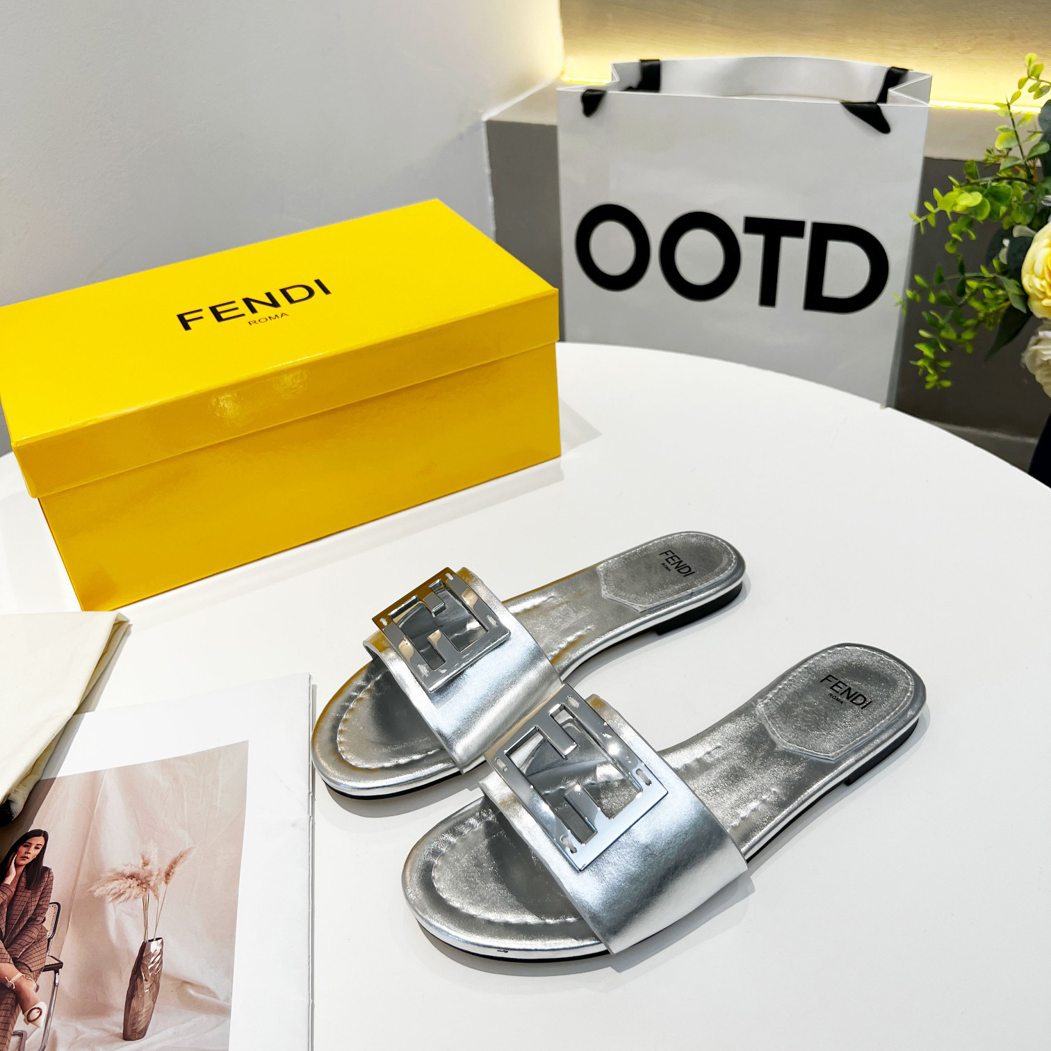 Fendi Baguette Silver Nappa Leather Slides - FashionPlug