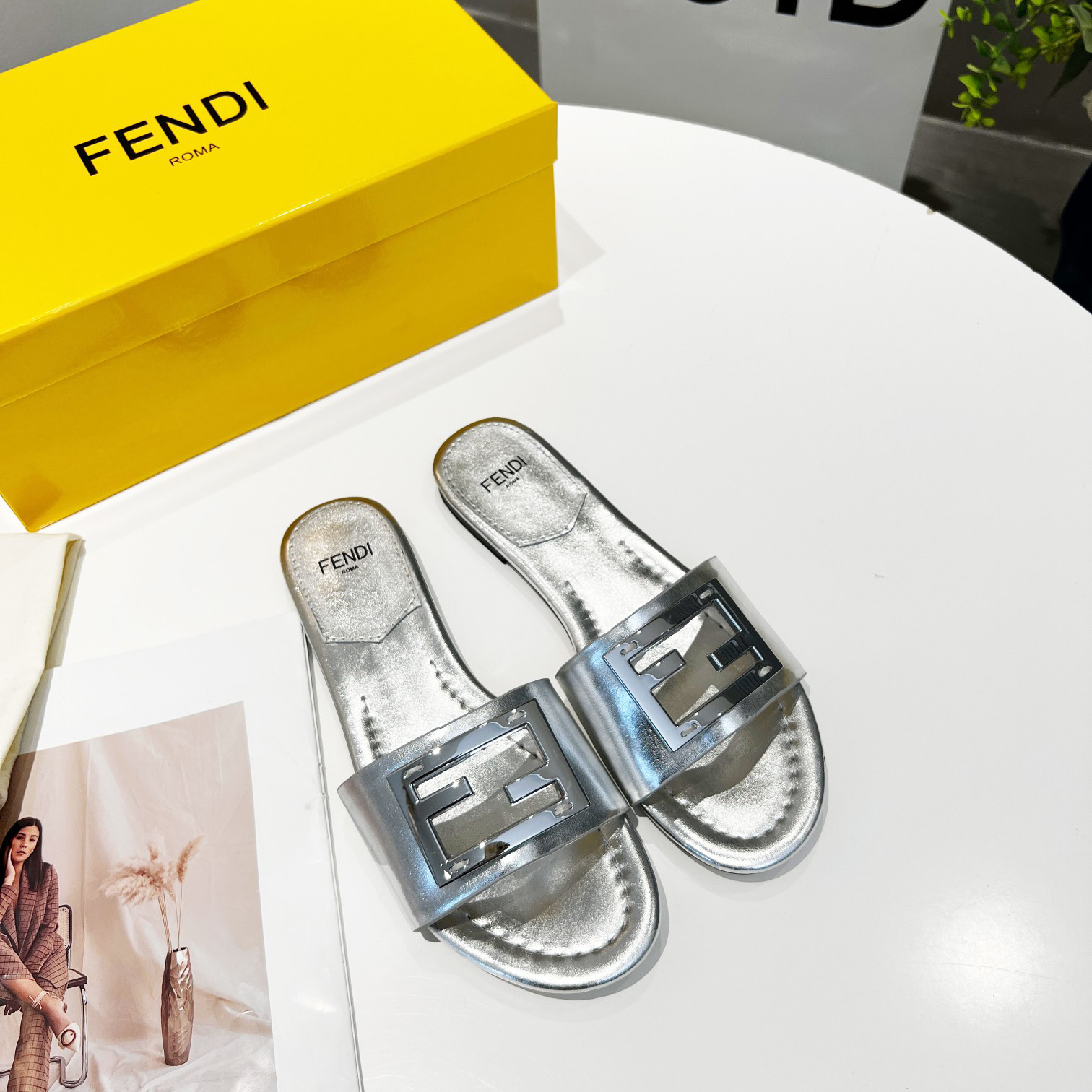 Fendi Baguette Silver Nappa Leather Slides - FashionPlug