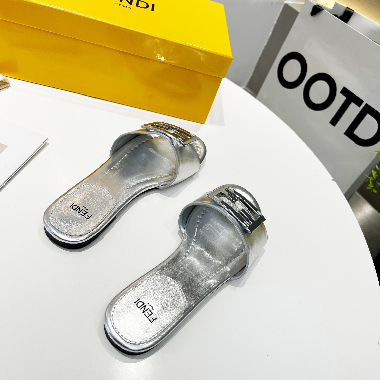 Fendi Baguette Silver Nappa Leather Slides - FashionPlug