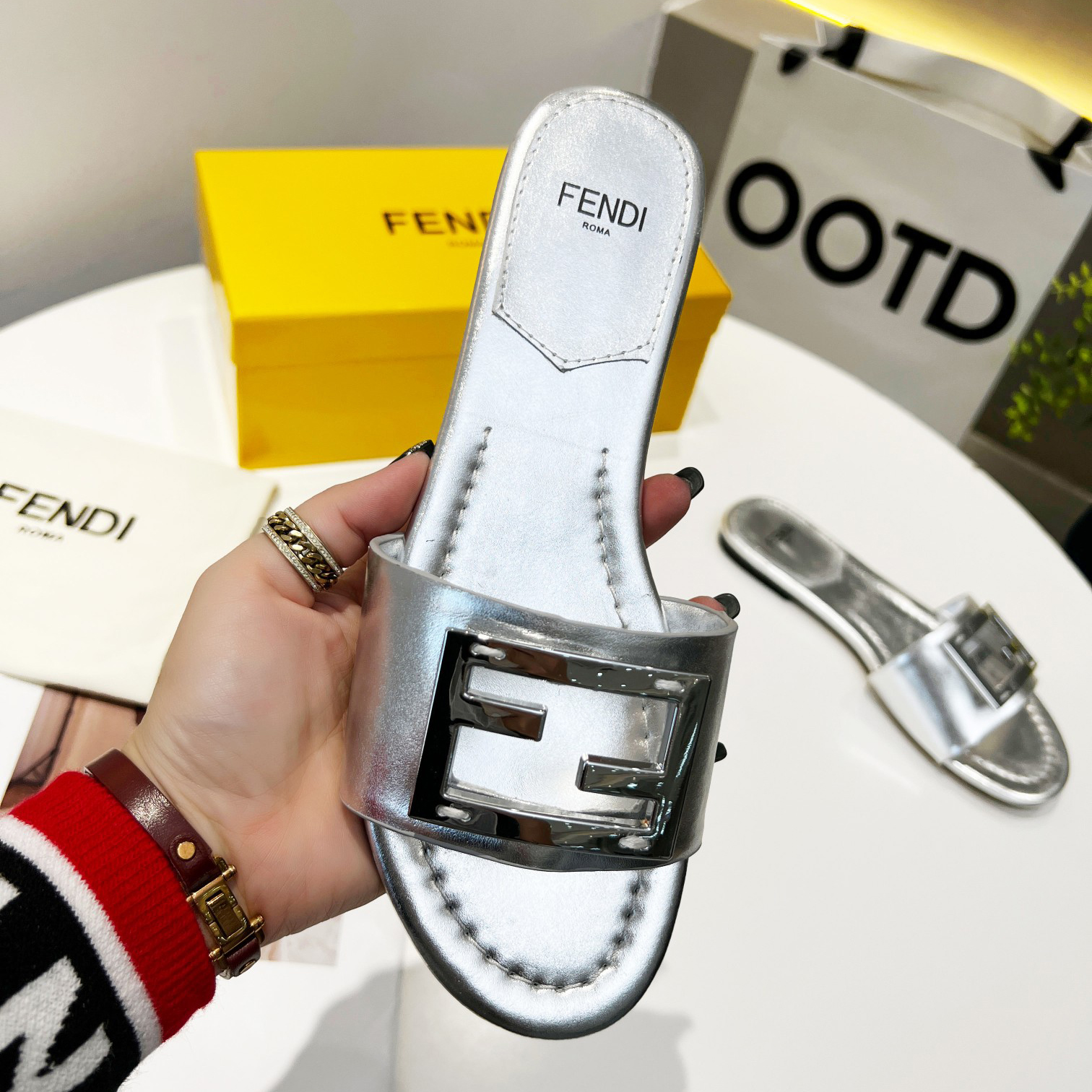 Fendi Baguette Silver Nappa Leather Slides - FashionPlug
