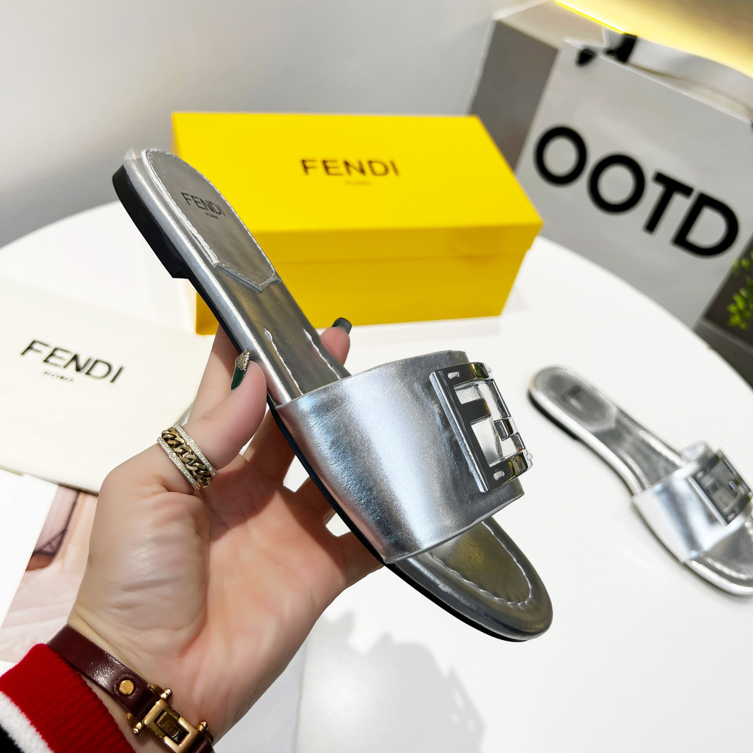 Fendi Baguette Silver Nappa Leather Slides - FashionPlug