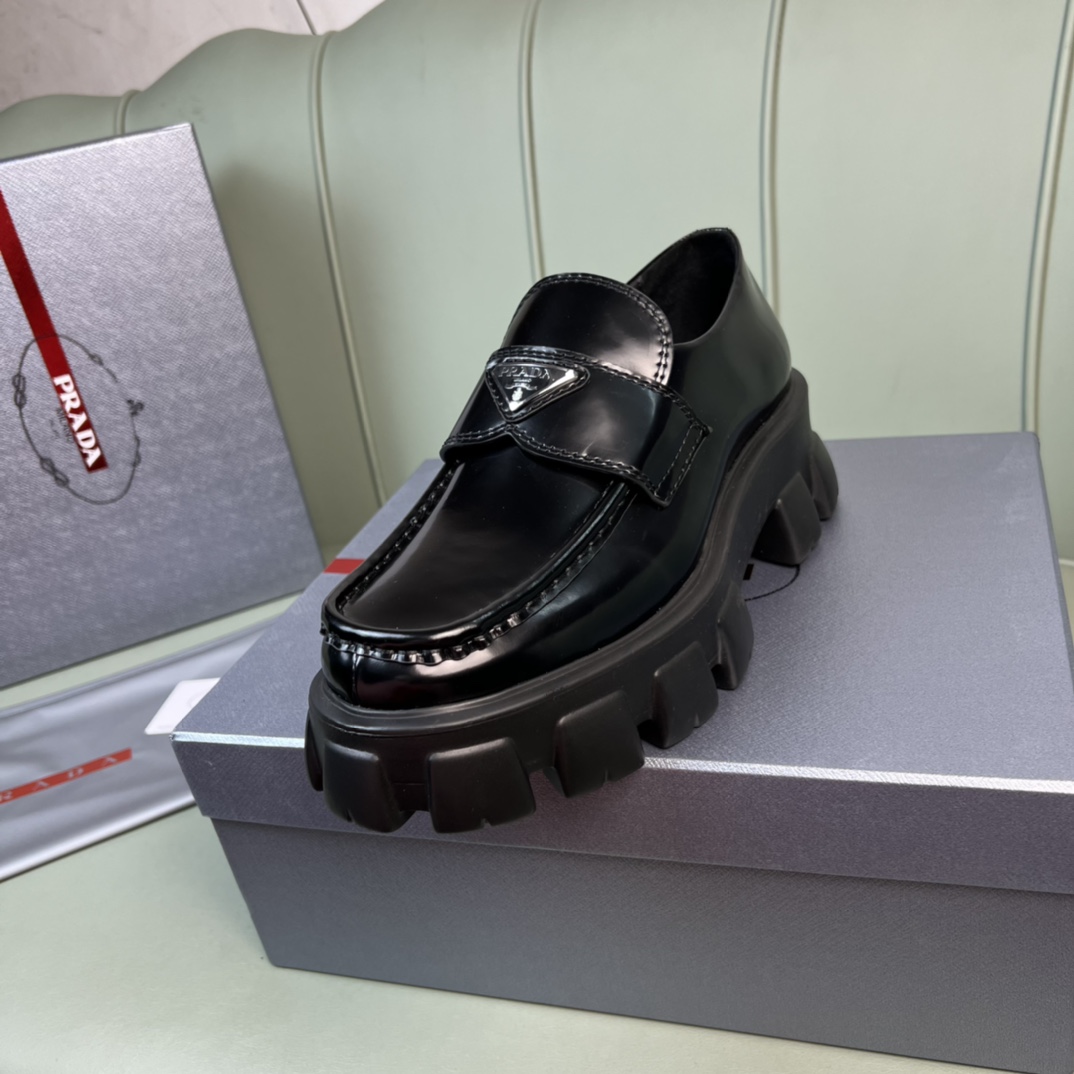 Prada Monolith Brushed Leather Loafers - FashionPlug