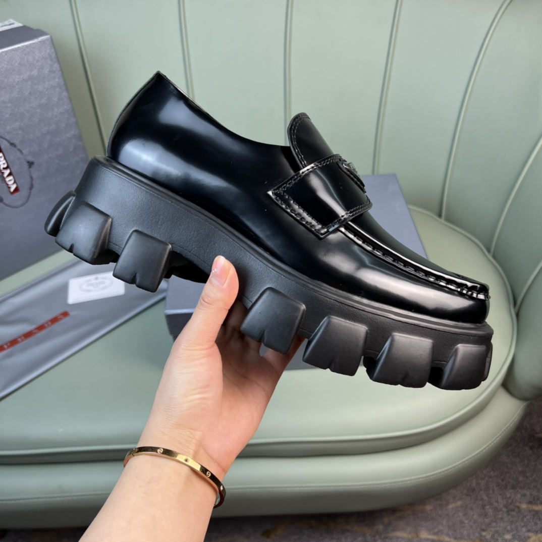 Prada Monolith Brushed Leather Loafers - FashionPlug
