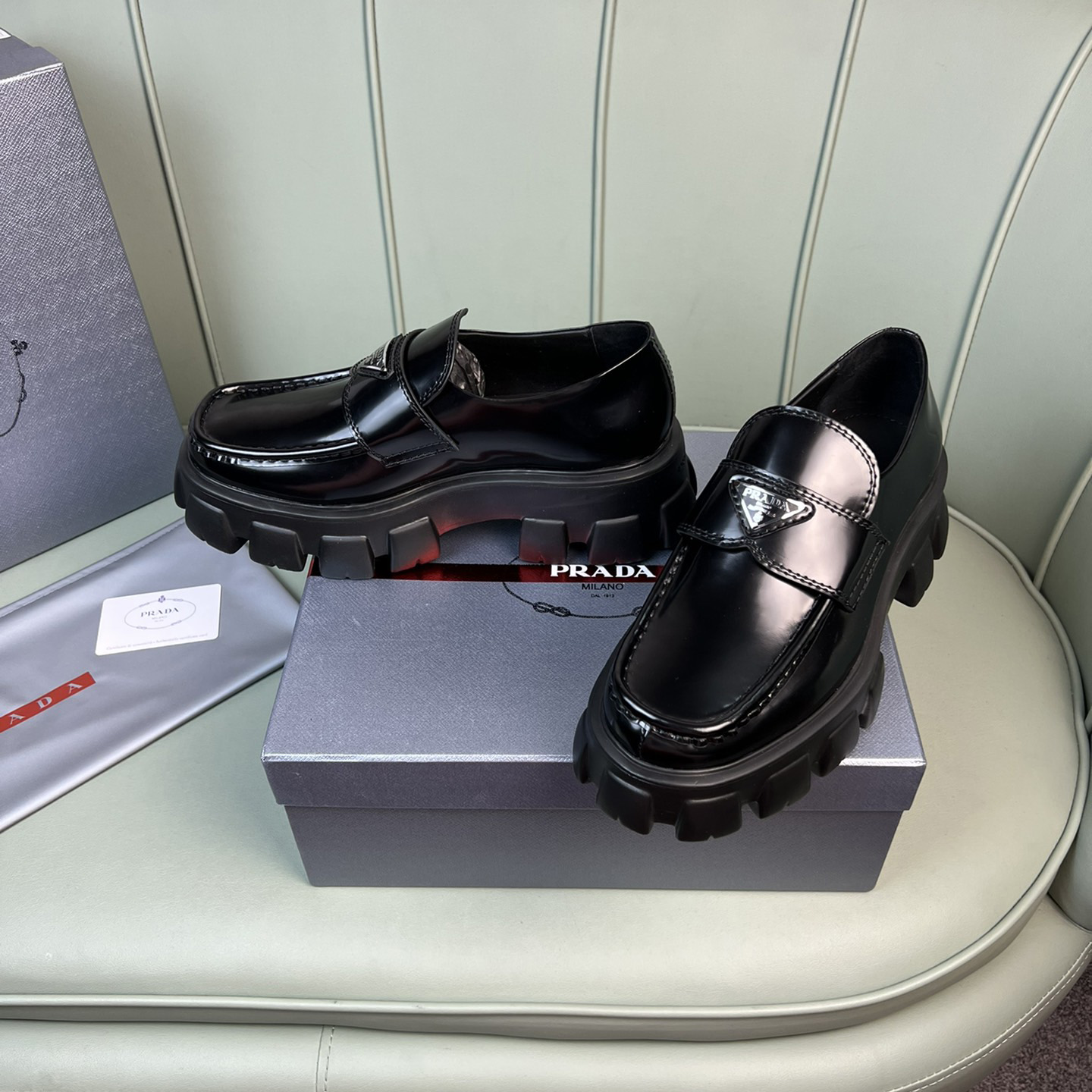 Prada Monolith Brushed Leather Loafers - FashionPlug