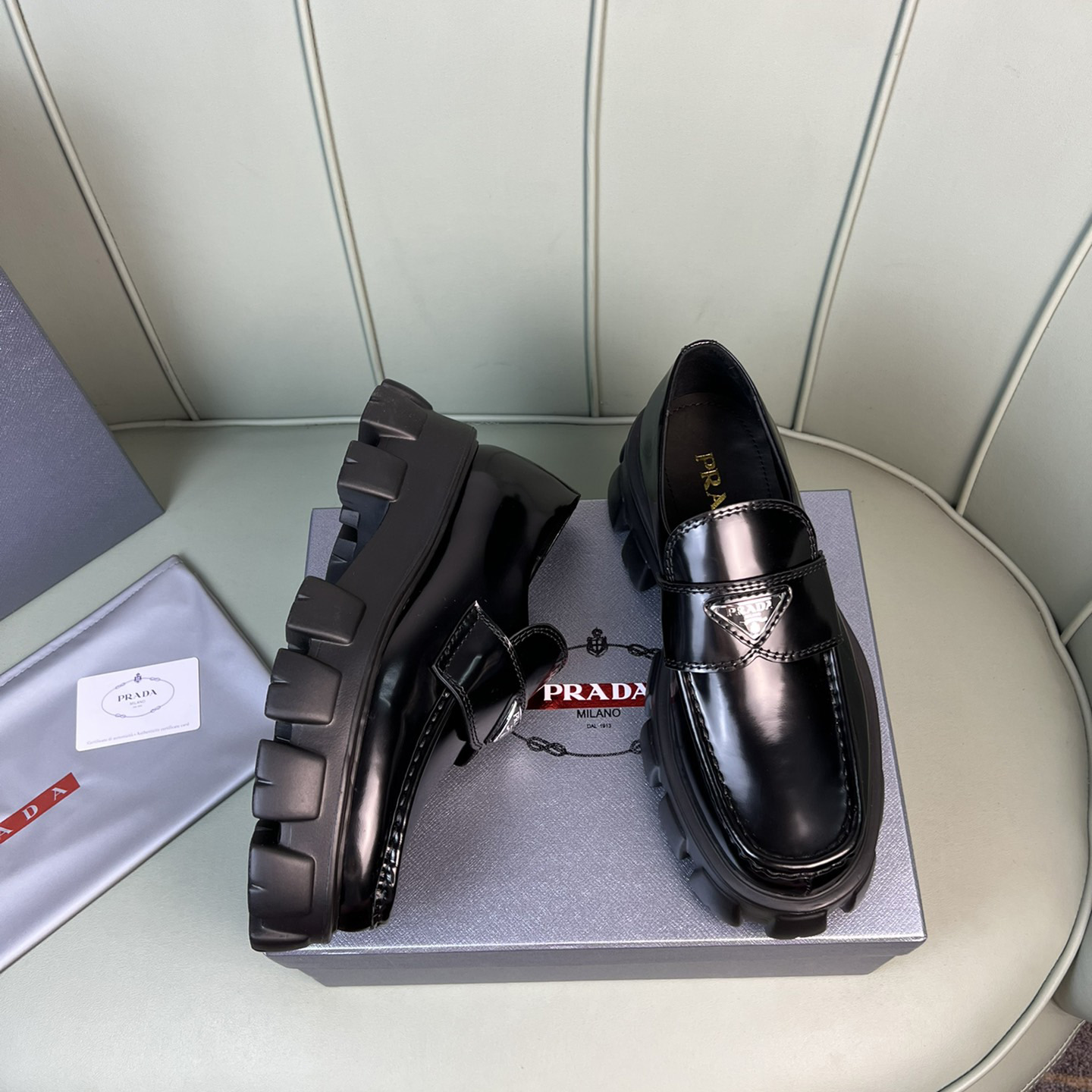 Prada Monolith Brushed Leather Loafers - FashionPlug