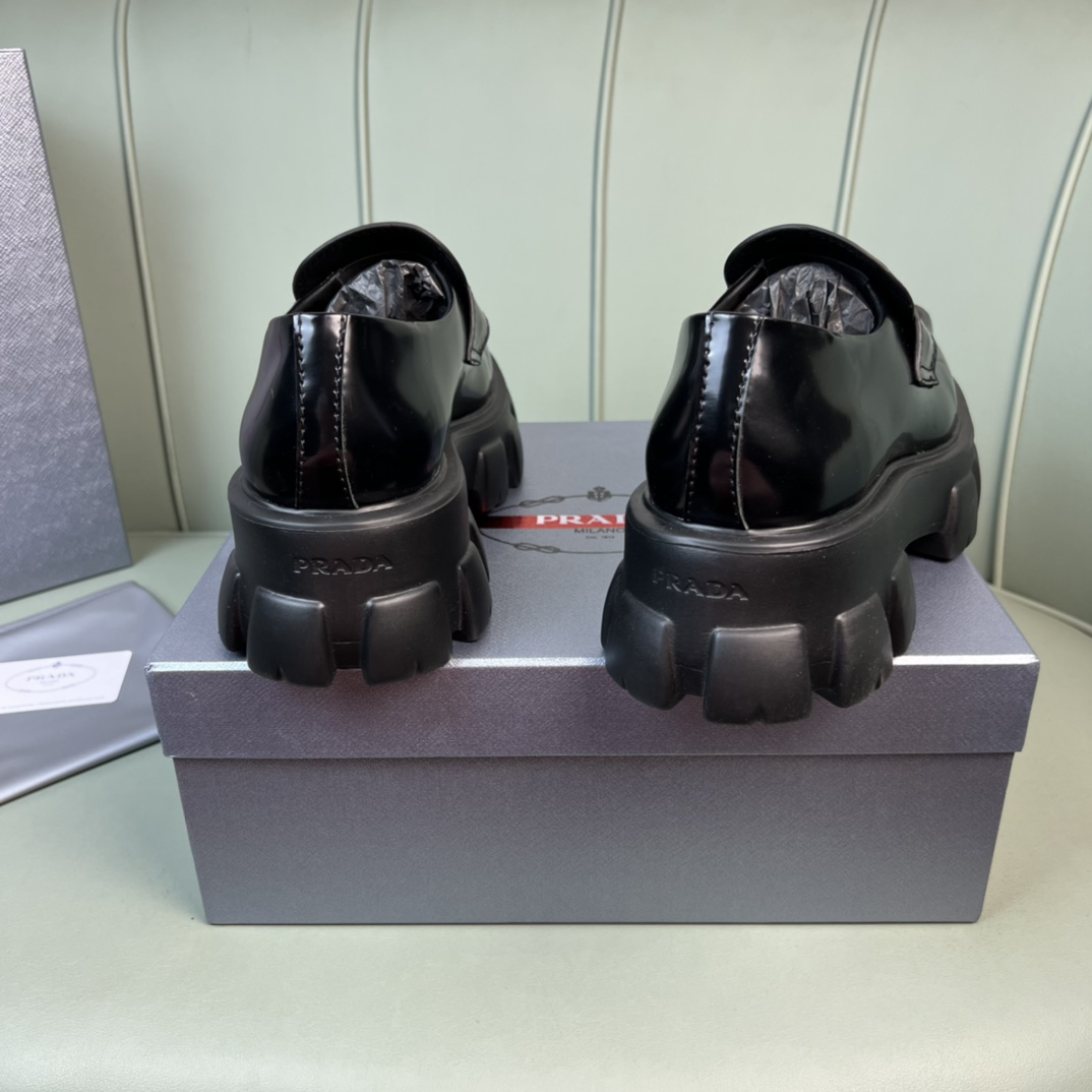 Prada Monolith Brushed Leather Loafers - FashionPlug