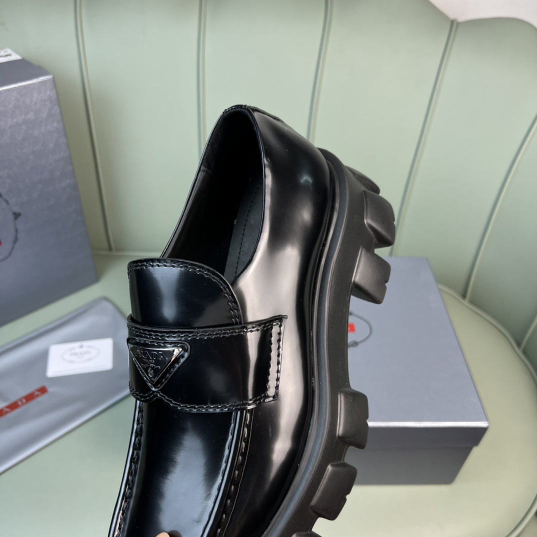 Prada Monolith Brushed Leather Loafers - FashionPlug