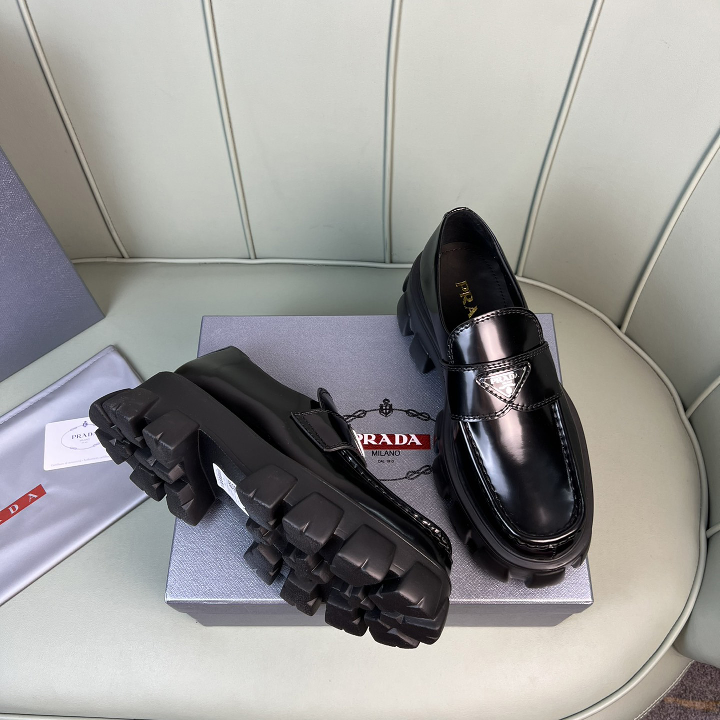 Prada Monolith Brushed Leather Loafers - FashionPlug