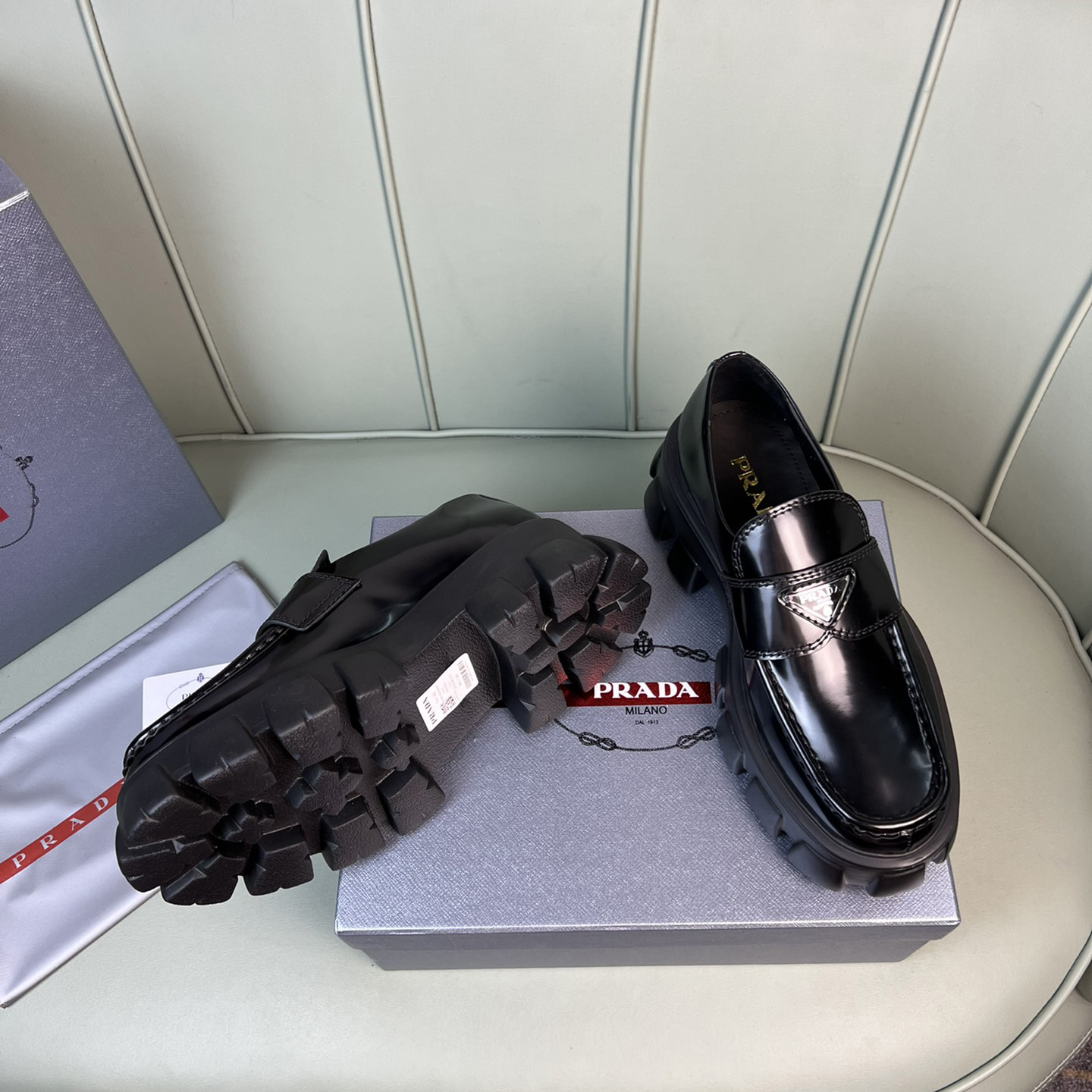 Prada Monolith Brushed Leather Loafers - FashionPlug