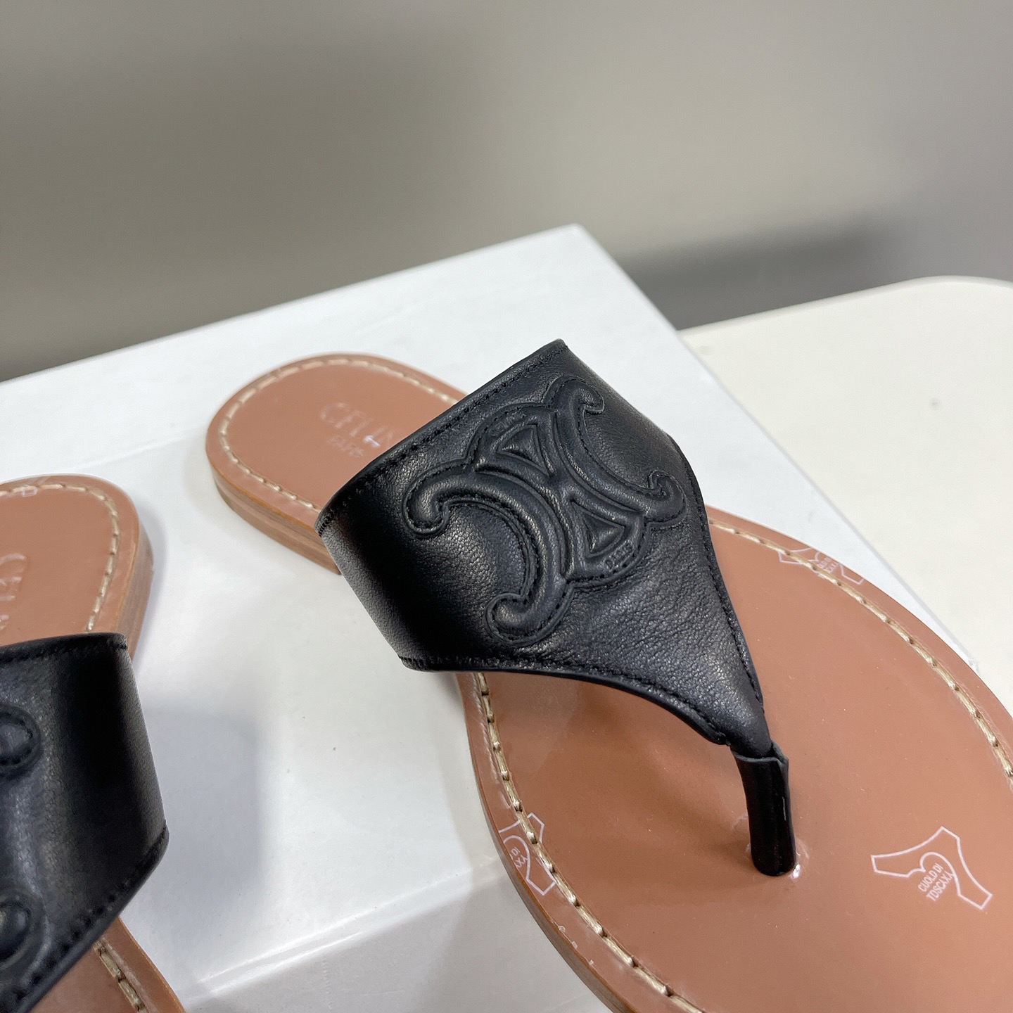 Celine Triomphe Flat Thong In Calfskin Black - FashionPlug