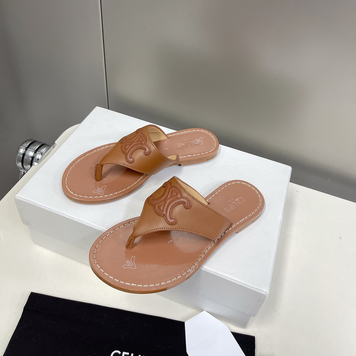Celine Triomphe Flat Thong In Calfskin Tan - FashionPlug