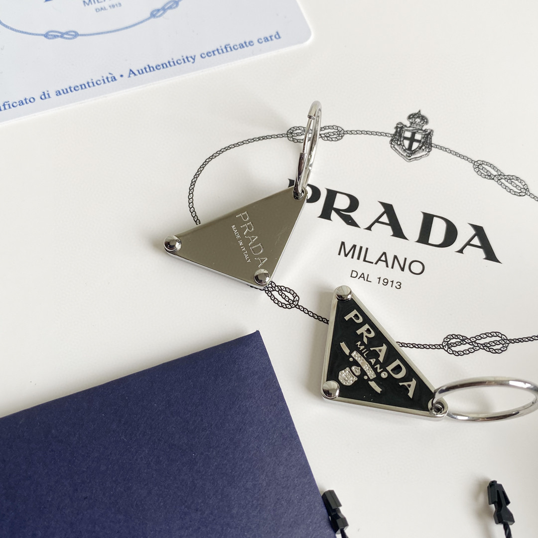 Prada Prada Symbole Pendant Earring - FashionPlug