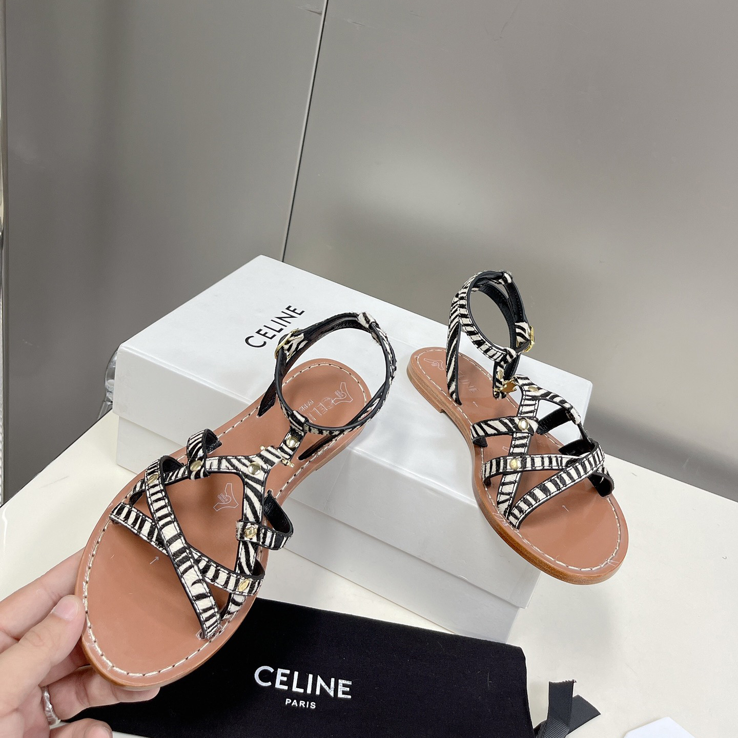 Celine Taillat Triomphe Sandal In Zebra Printed Hairy Calfskin Black/White - FashionPlug