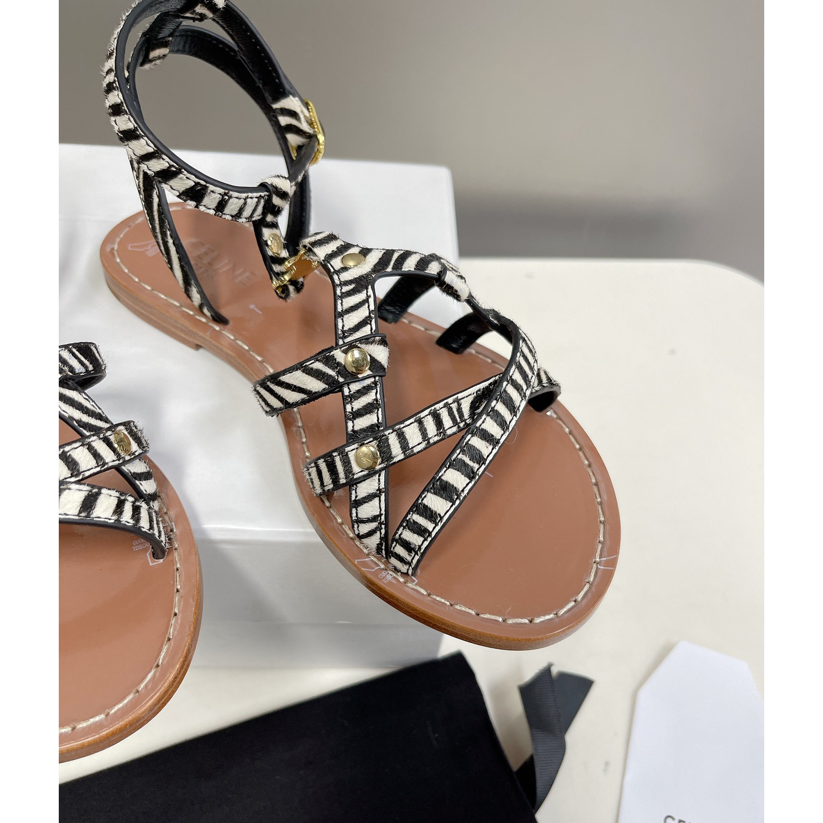 Celine Taillat Triomphe Sandal In Zebra Printed Hairy Calfskin Black/White - FashionPlug
