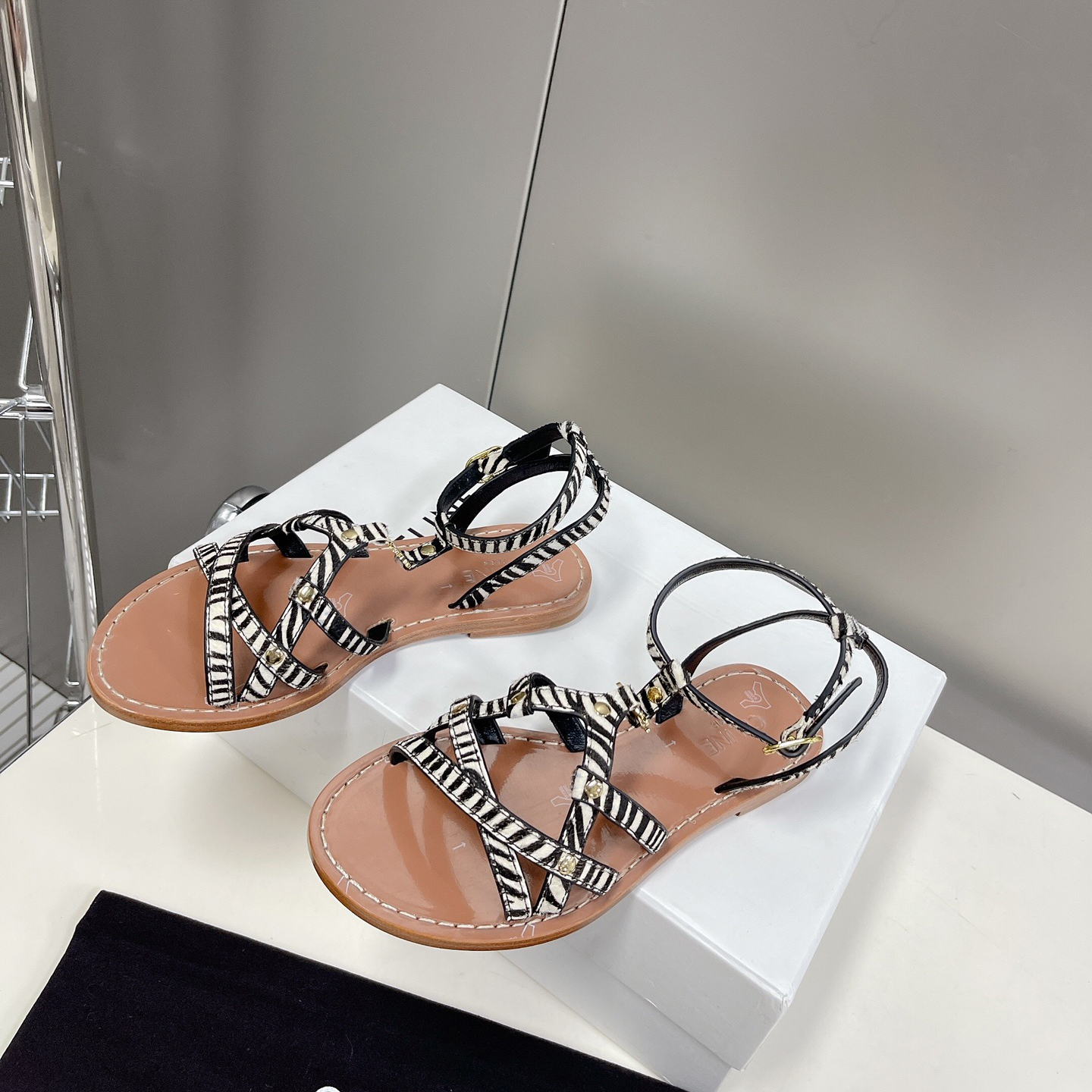Celine Taillat Triomphe Sandal In Zebra Printed Hairy Calfskin Black/White - FashionPlug