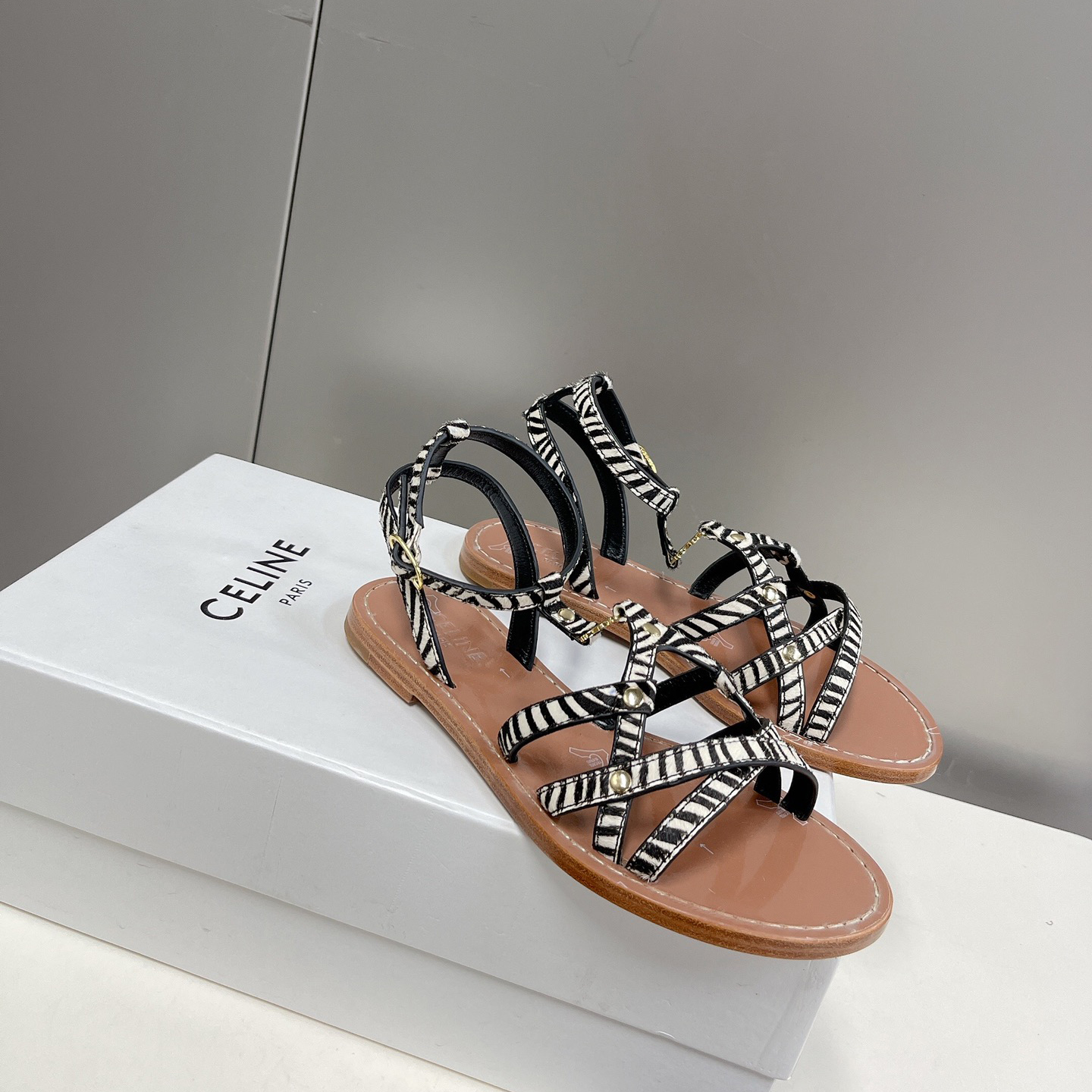 Celine Taillat Triomphe Sandal In Zebra Printed Hairy Calfskin Black/White - FashionPlug