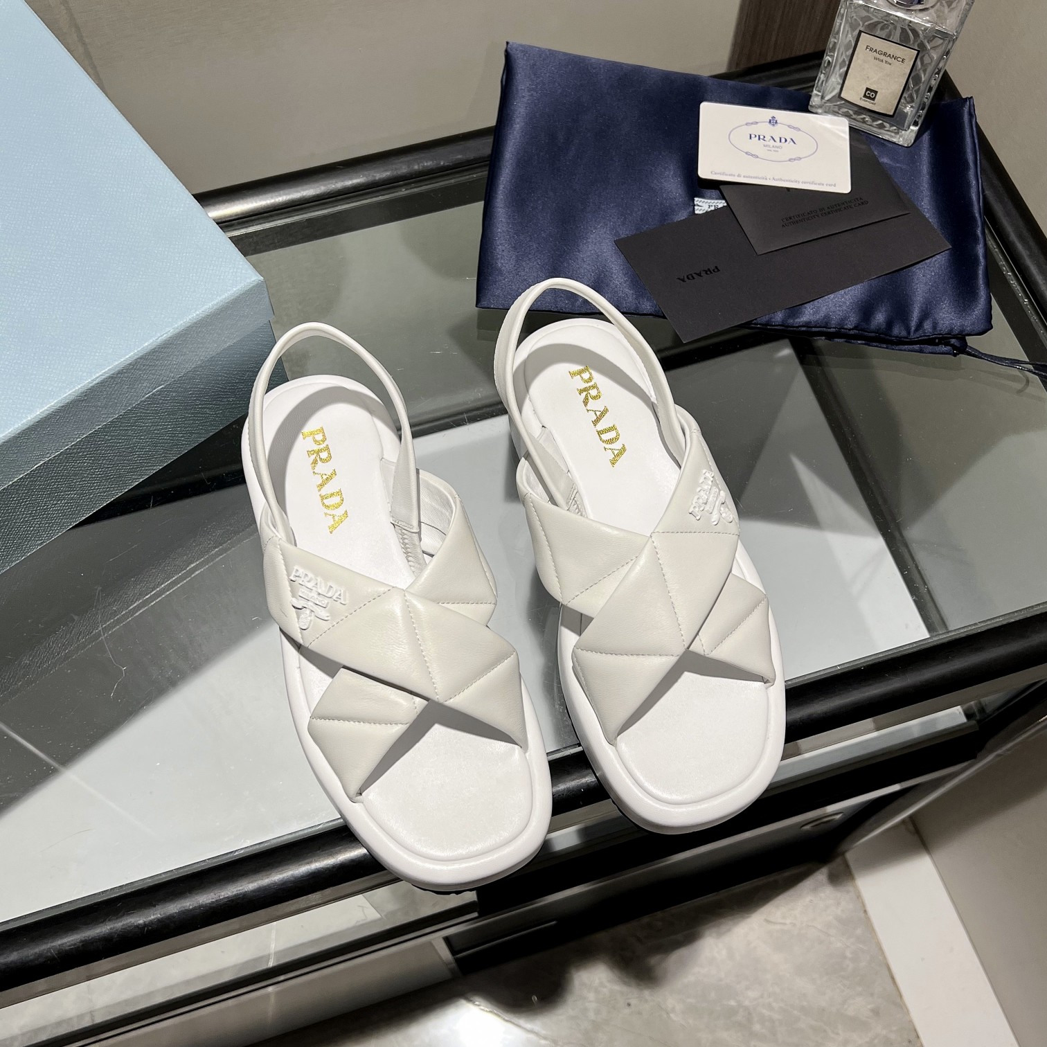 Prada Quilted Nappa Leather Flatform Sandals - FashionPlug