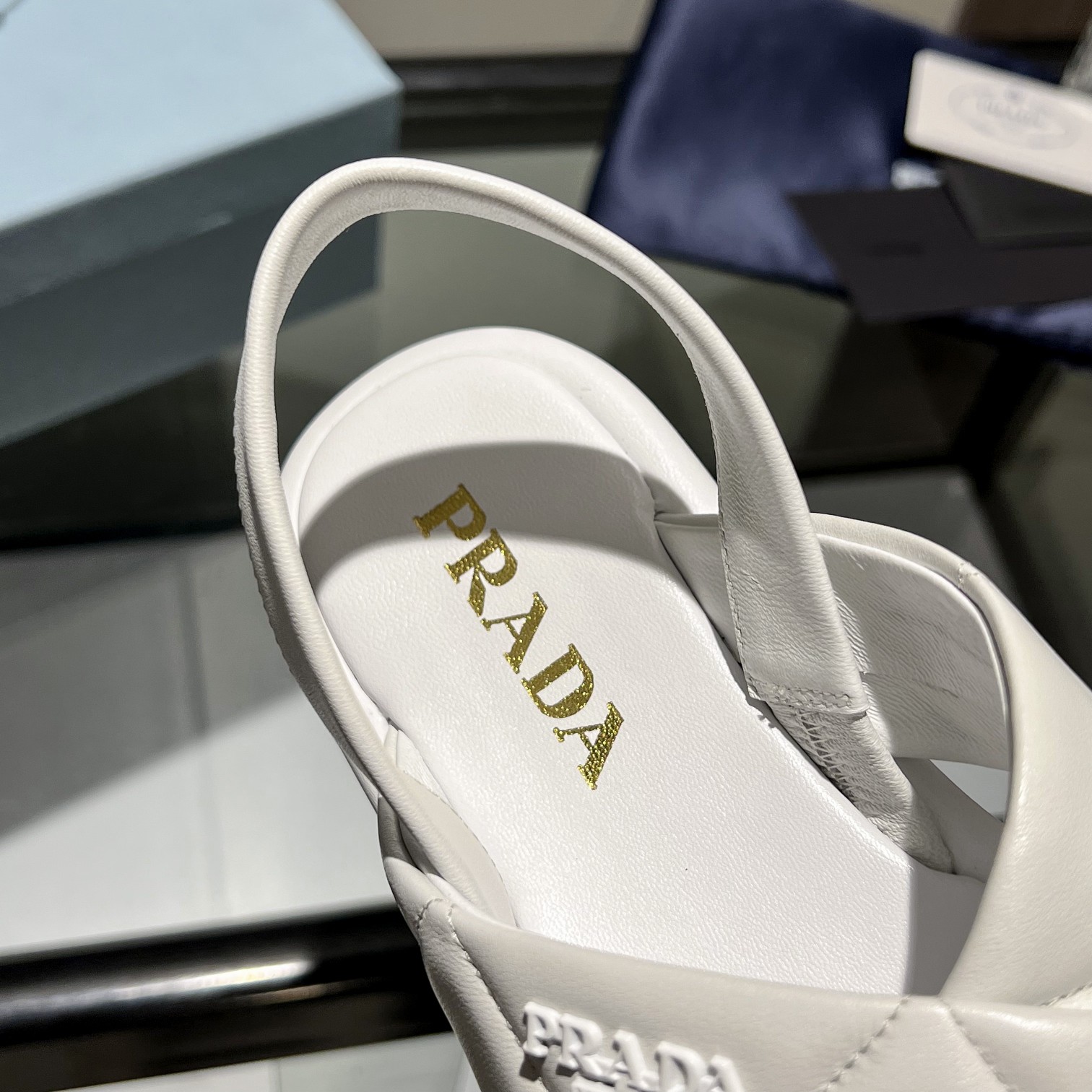 Prada Quilted Nappa Leather Flatform Sandals - FashionPlug