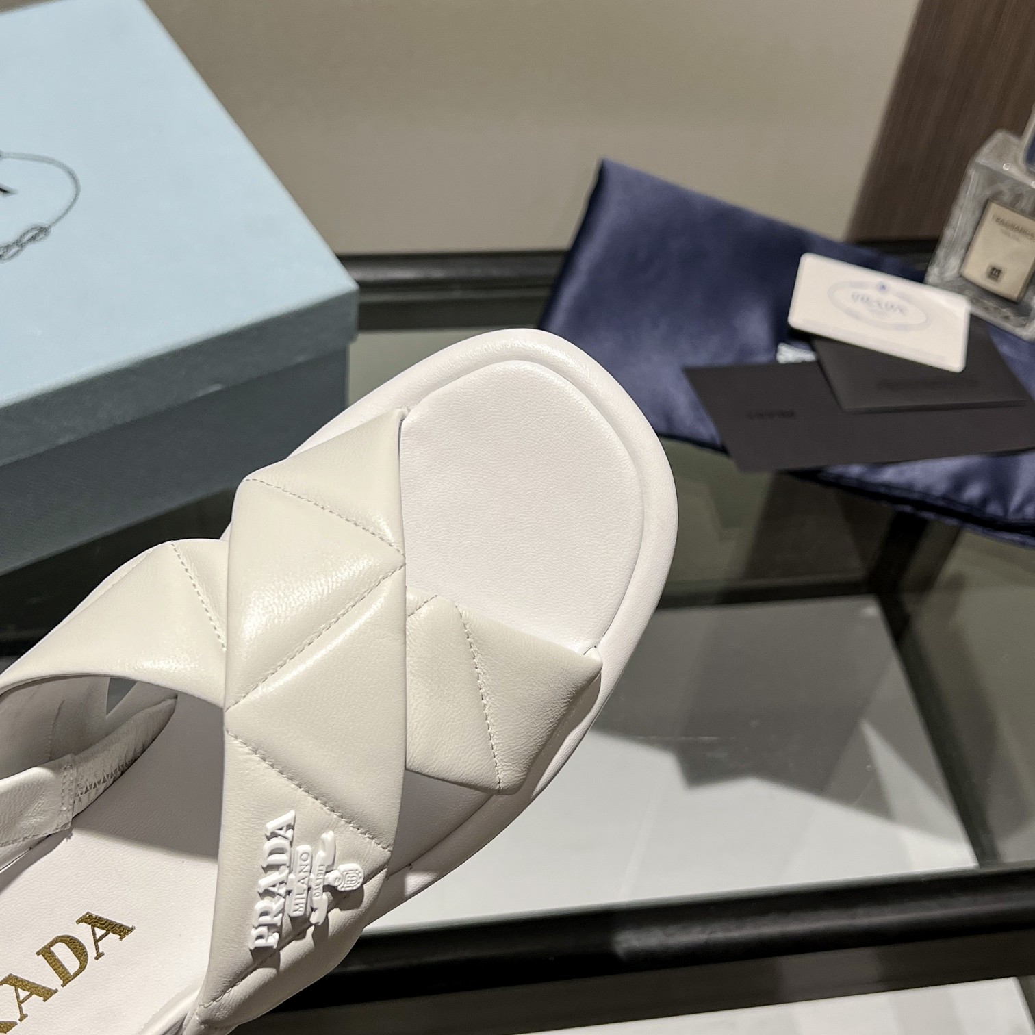 Prada Quilted Nappa Leather Flatform Sandals - FashionPlug