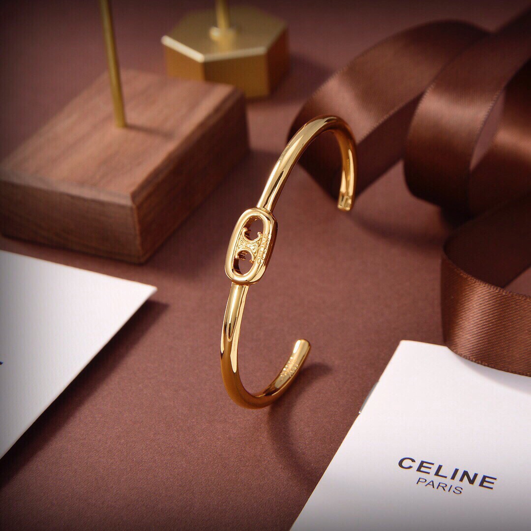 Celine Maillon Triomphe Thin Cuff In Brass With Gold Finish - FashionPlug