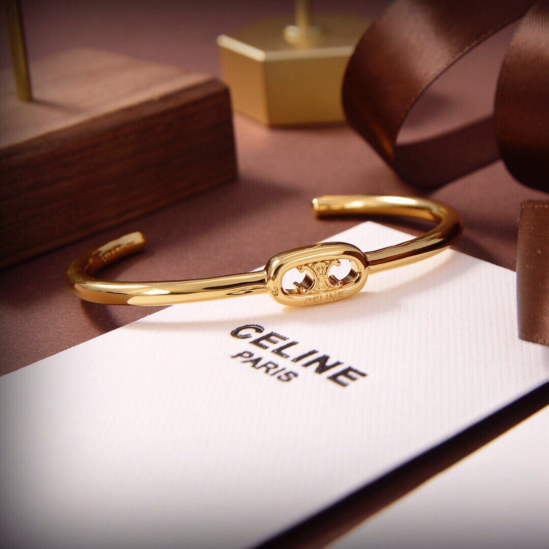 Celine Maillon Triomphe Thin Cuff In Brass With Gold Finish - FashionPlug