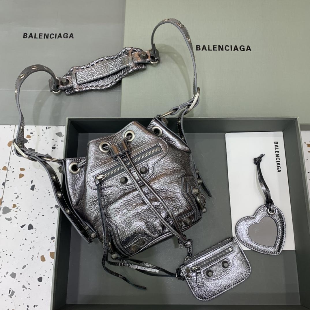 Balenciaga Le Cagole XS Bucket Bag In Silver Metallized Arena Lambskin, Aged-Silver Hardware With White Rhinestones(15-19.8-17.8cm) - FashionPlug