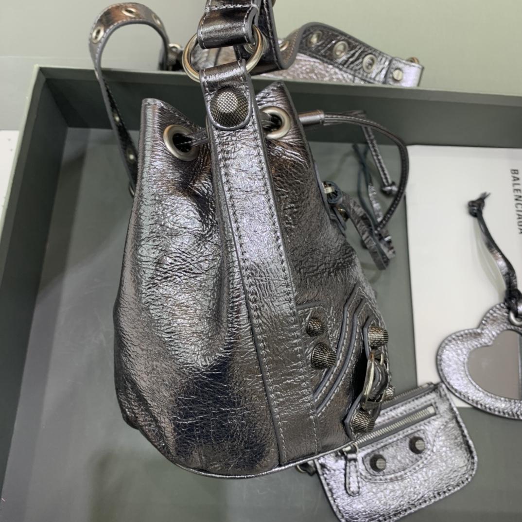 Balenciaga Le Cagole XS Bucket Bag In Silver Metallized Arena Lambskin, Aged-Silver Hardware With White Rhinestones(15-19.8-17.8cm) - FashionPlug