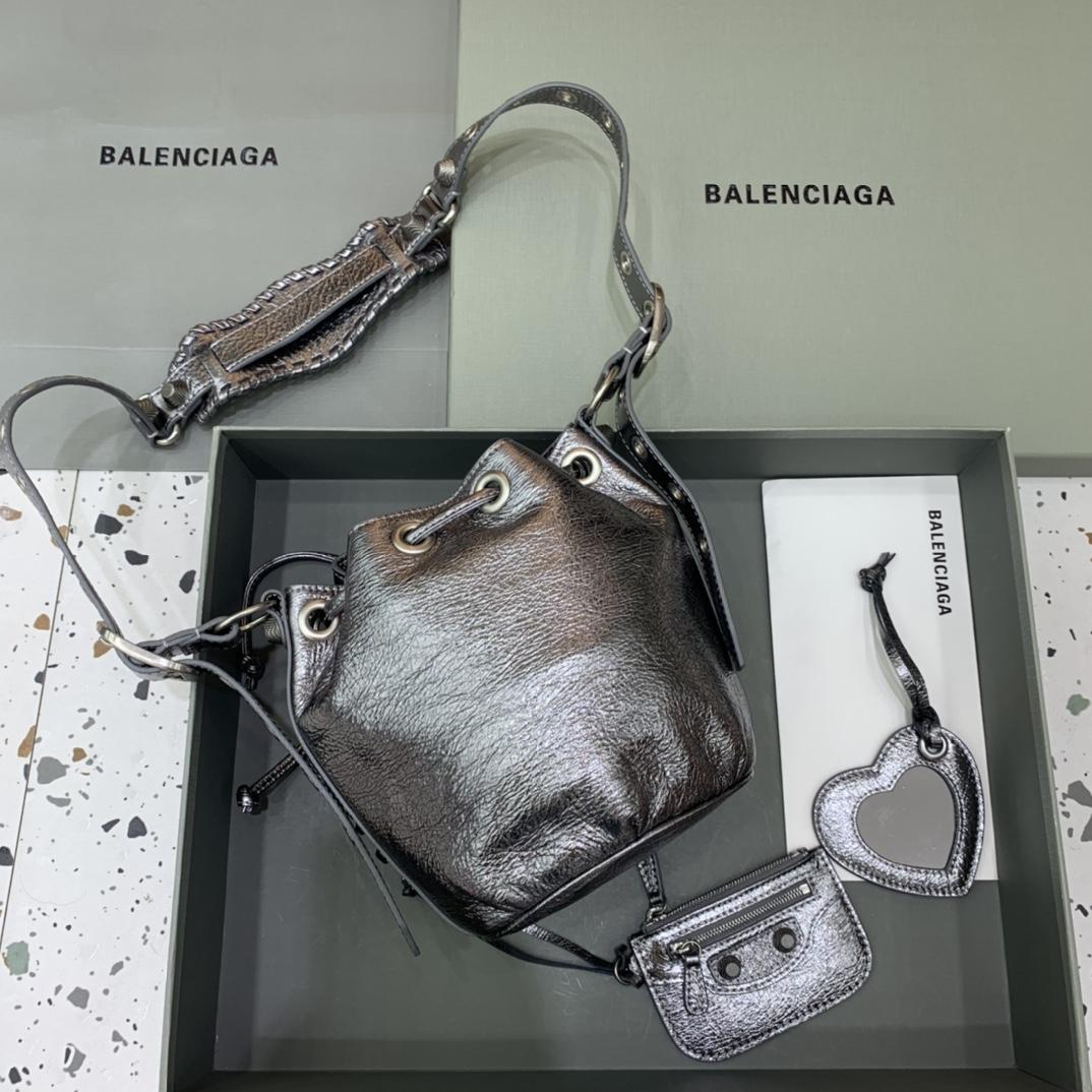 Balenciaga Le Cagole XS Bucket Bag In Silver Metallized Arena Lambskin, Aged-Silver Hardware With White Rhinestones(15-19.8-17.8cm) - FashionPlug