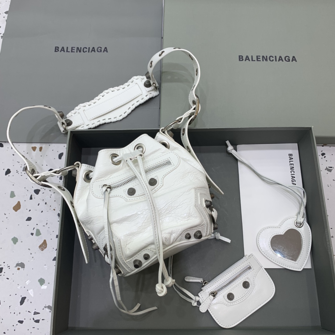 Balenciaga Le Cagole XS Bucket Bag In White Arena Lambskin, Aged-Silver Hardware(15-19.8-17.8cm) - FashionPlug