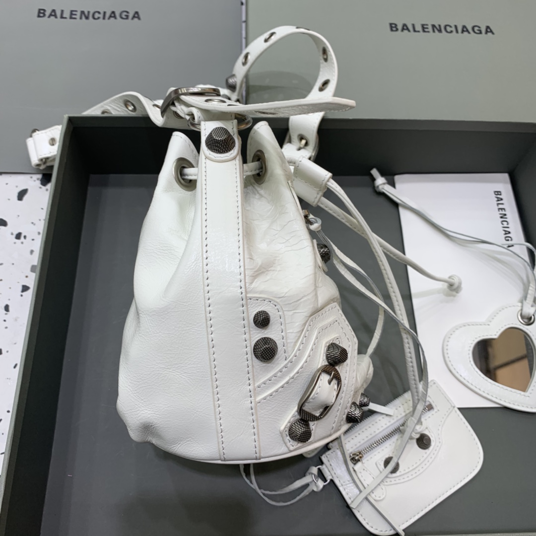 Balenciaga Le Cagole XS Bucket Bag In White Arena Lambskin, Aged-Silver Hardware(15-19.8-17.8cm) - FashionPlug