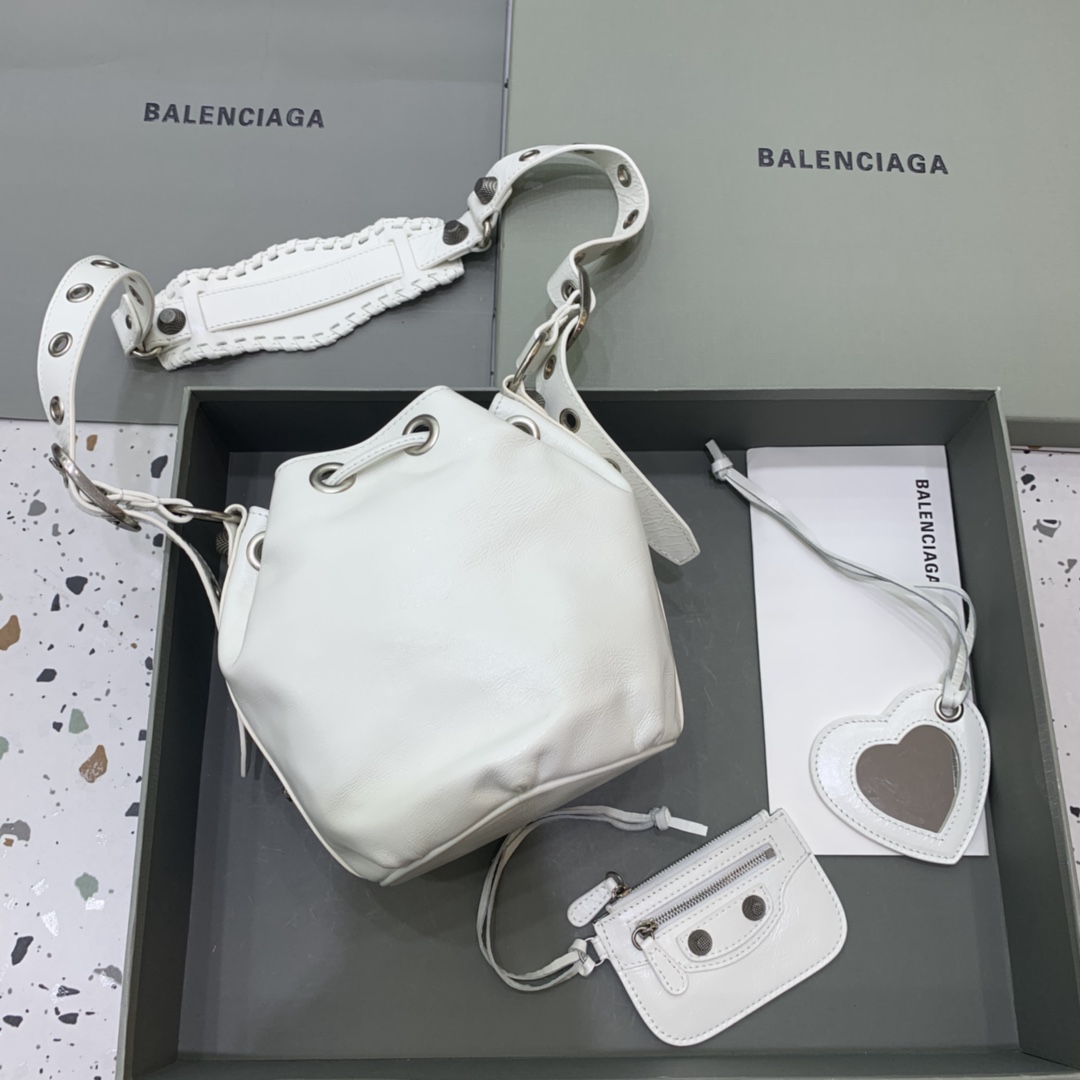 Balenciaga Le Cagole XS Bucket Bag In White Arena Lambskin, Aged-Silver Hardware(15-19.8-17.8cm) - FashionPlug