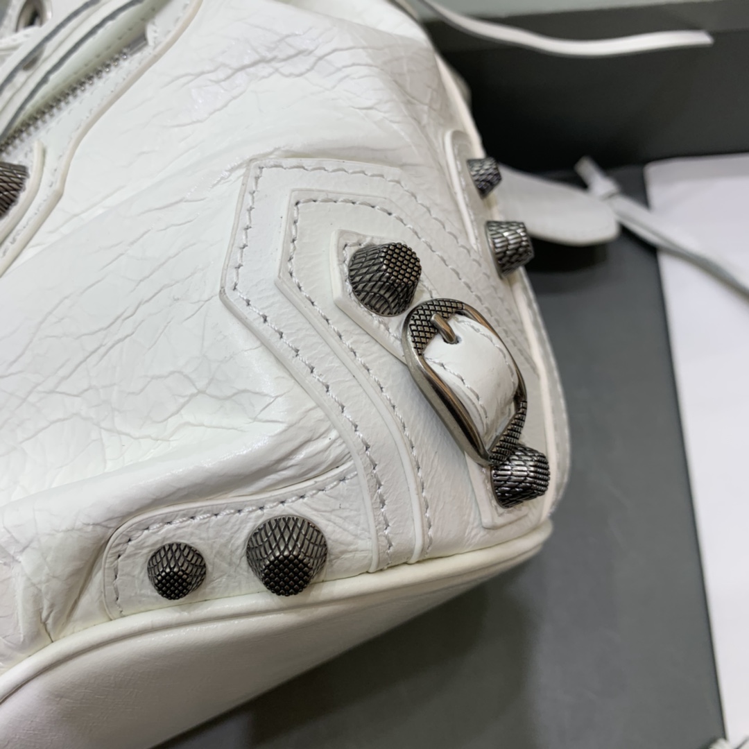 Balenciaga Le Cagole XS Bucket Bag In White Arena Lambskin, Aged-Silver Hardware(15-19.8-17.8cm) - FashionPlug