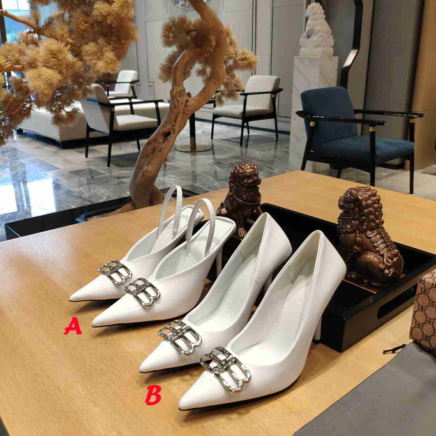 Balenciaga BB Leather Pumps - FashionPlug