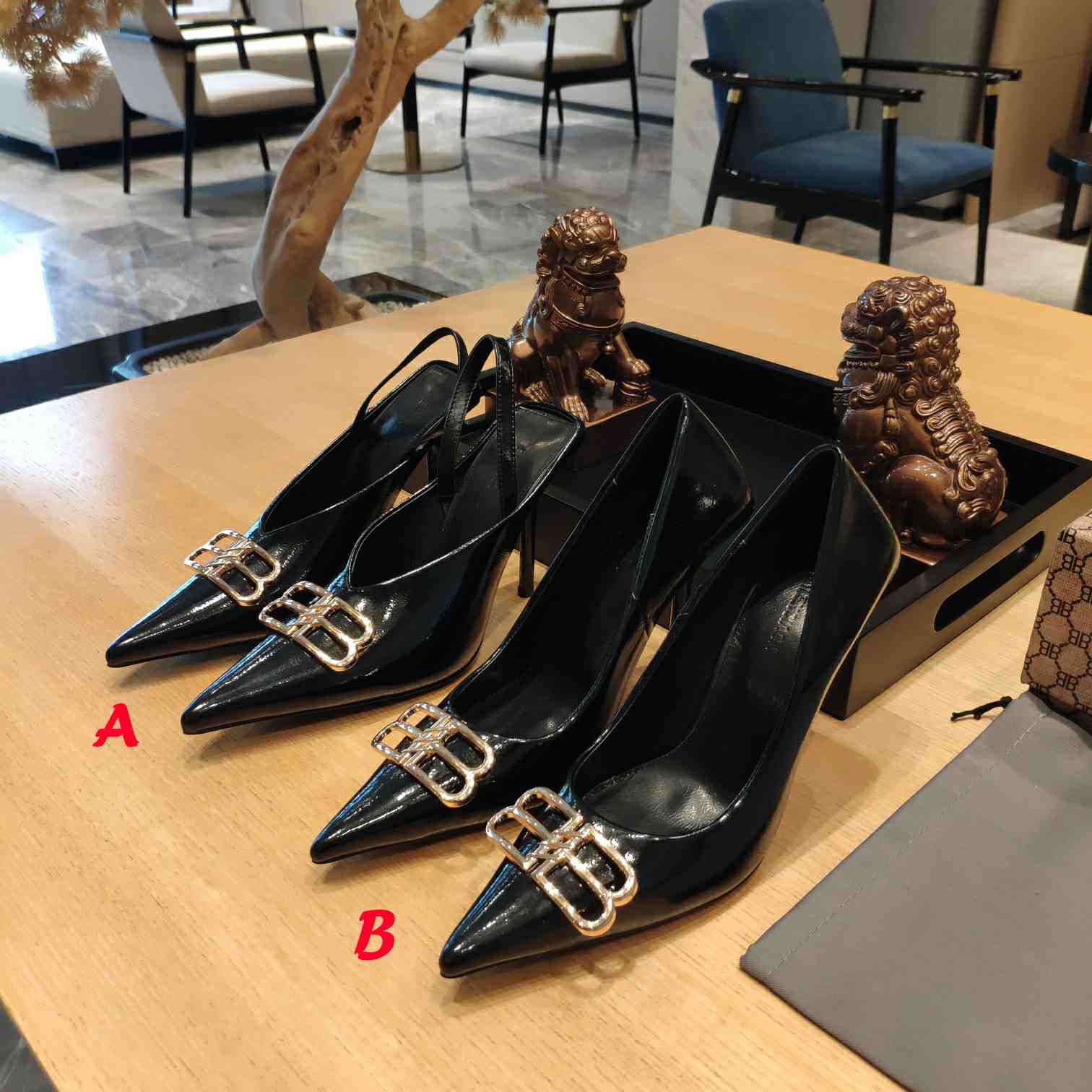 Balenciaga BB Leather Pumps - FashionPlug