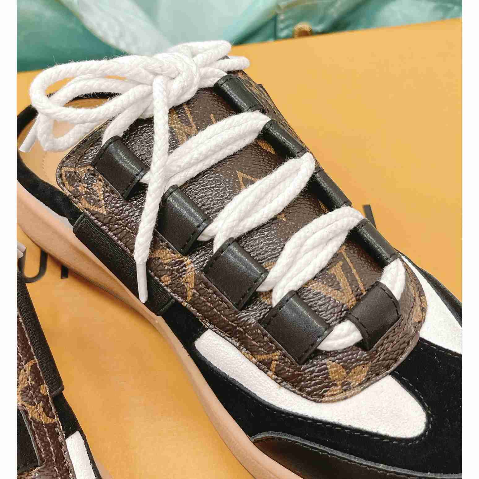 Louis Vuitton Lous Open Back Sneaker    1AAOOH - FashionPlug