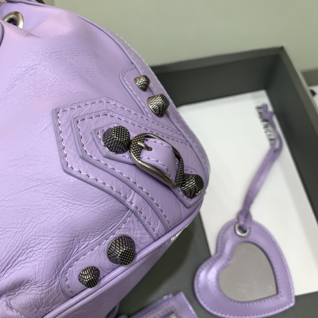 Balenciaga Le Cagole XS Bucket Bag In Light Purple Arena Lambskin, Aged-Silver Hardware(15-19.8-17.8cm) - FashionPlug