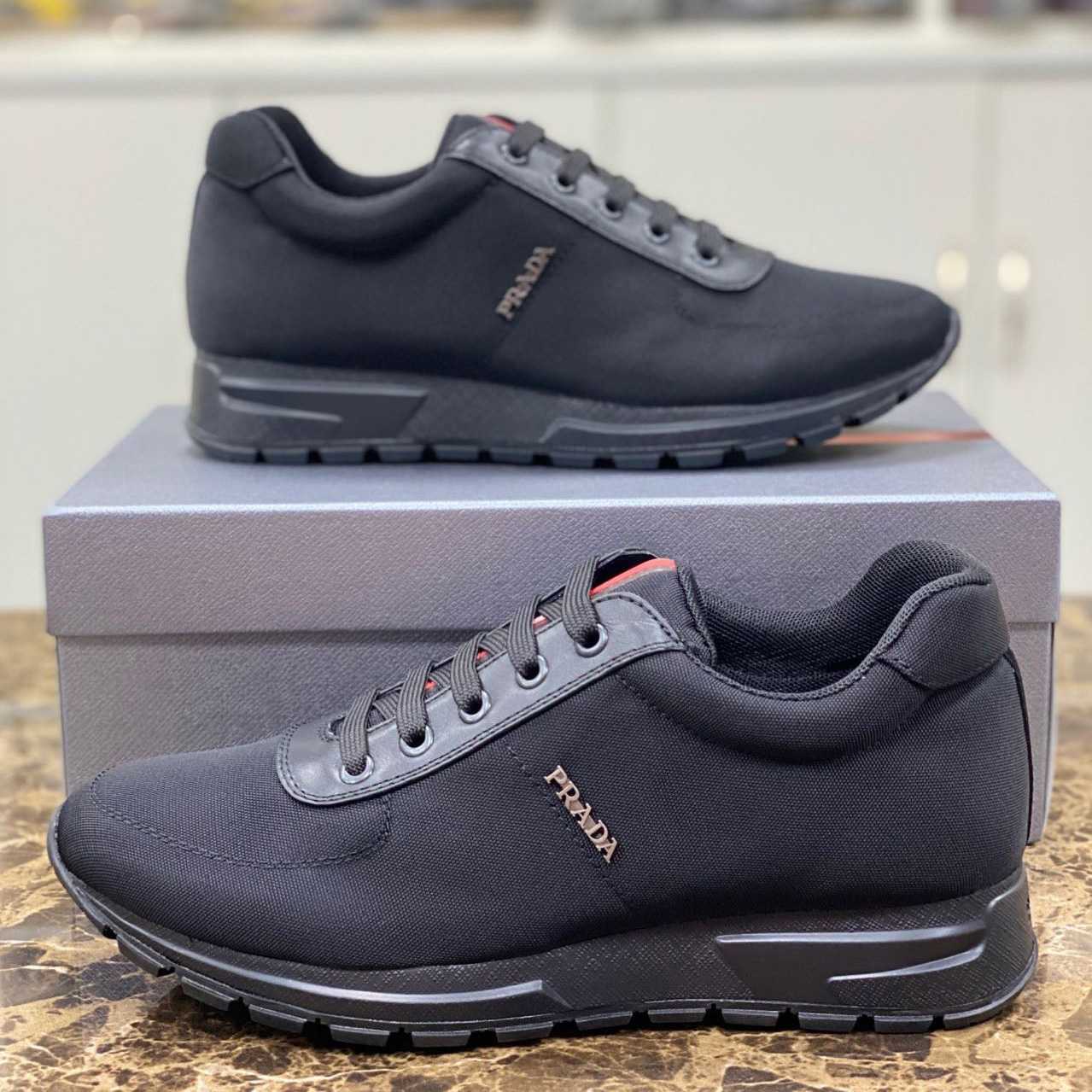 Prada Nylon And Leather Sneakers - FashionPlug