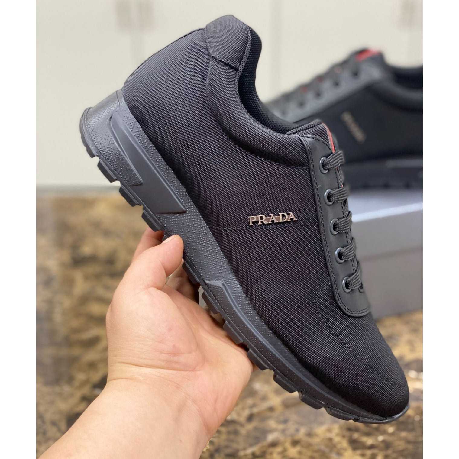 Prada Nylon And Leather Sneakers - FashionPlug