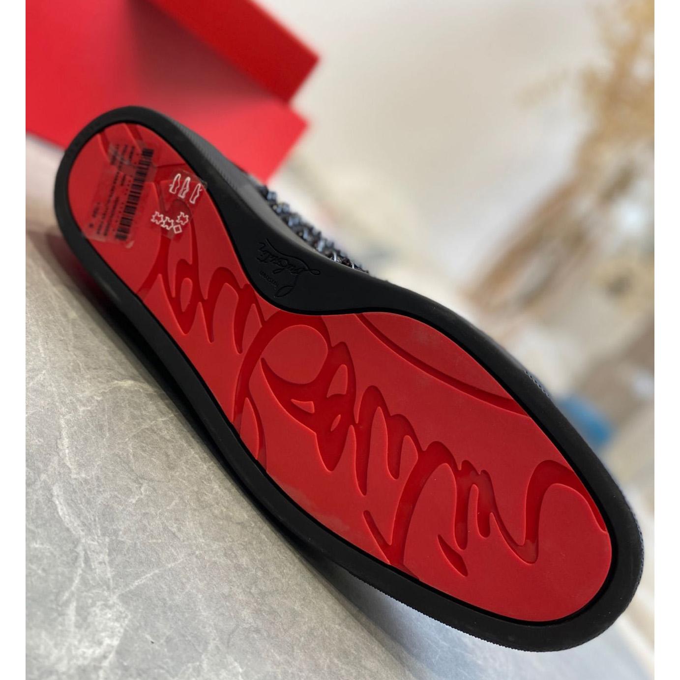 Christian Louboutin Sneaker  - FashionPlug