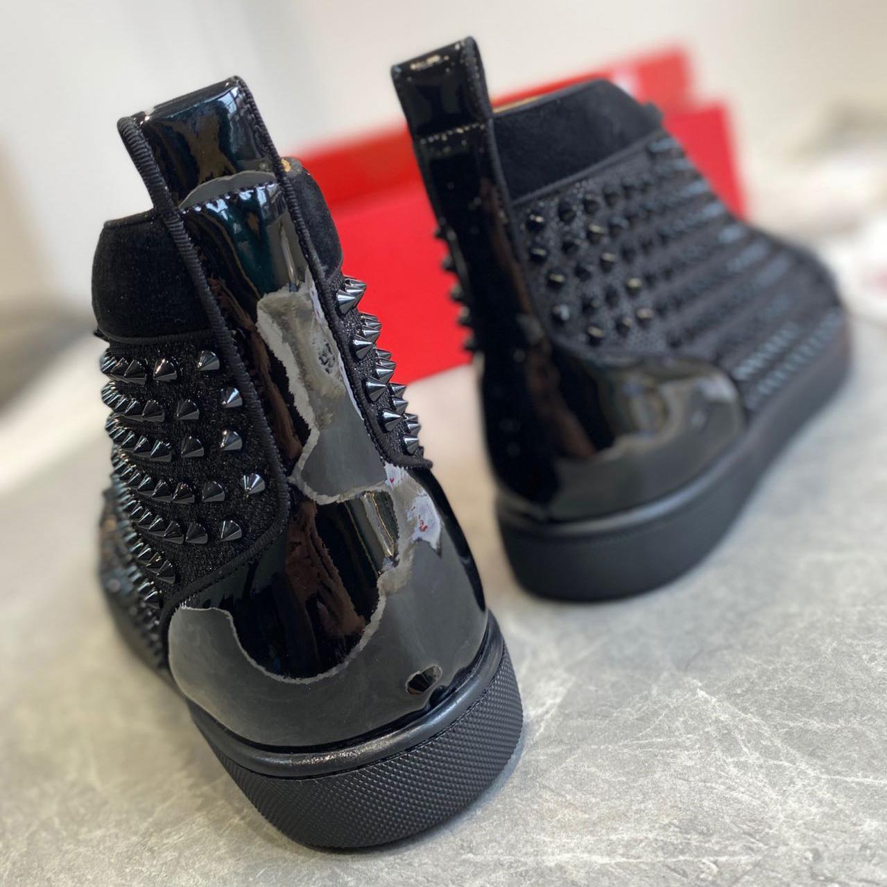 Christian Louboutin Sneaker  - FashionPlug