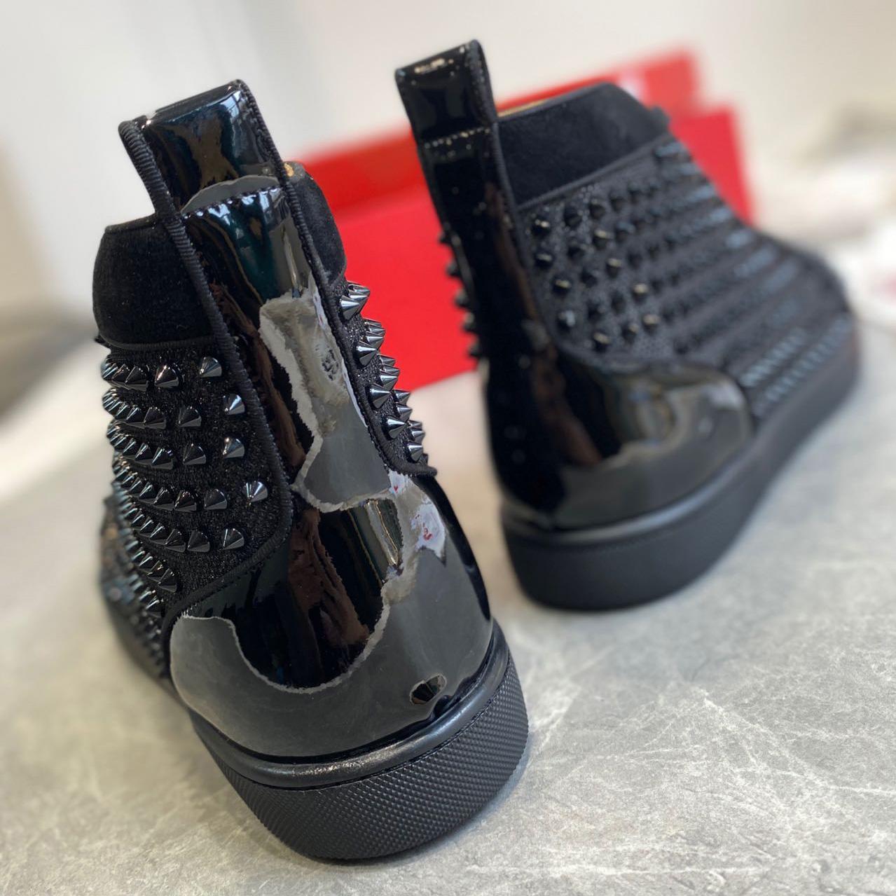 Christian Louboutin Sneaker  - FashionPlug