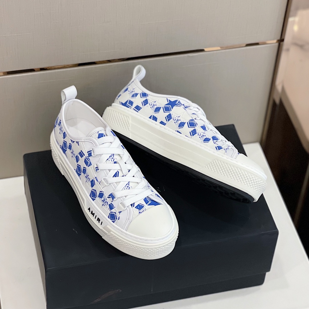 Amiri Low Top Sneaker - FashionPlug