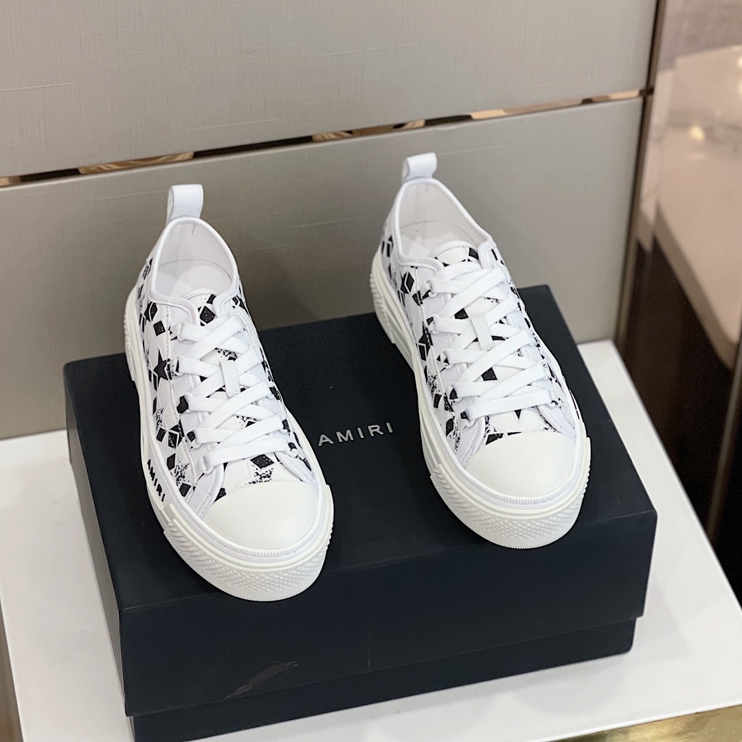 Amiri Low Top Sneaker - FashionPlug