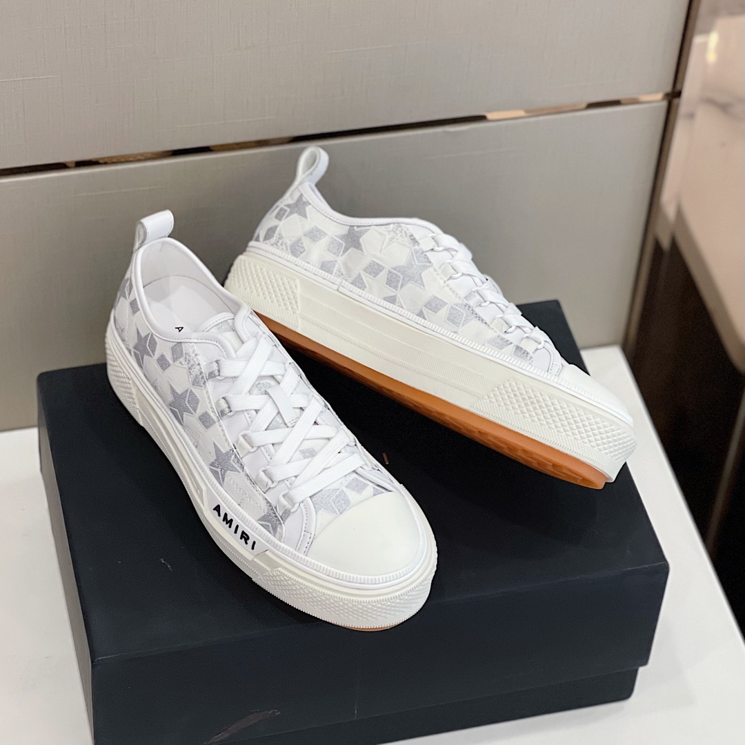 Amiri Low Top Sneaker - FashionPlug